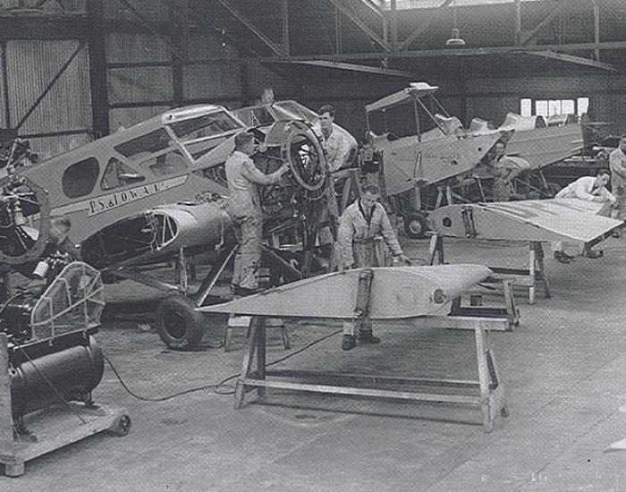 Engineers working on airoplanes